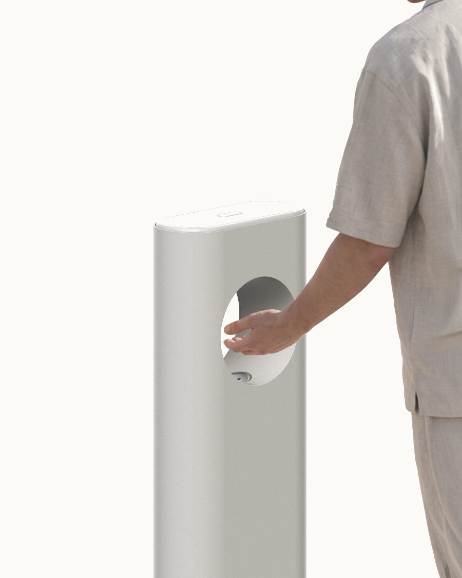 The dispenser with the lid closed after the cartridge is seated