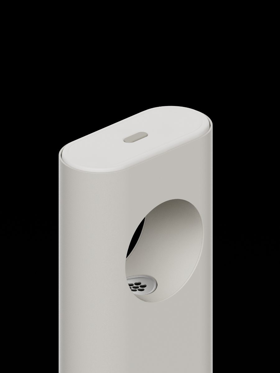 A person reaching a hand into the dispenser's ring opening